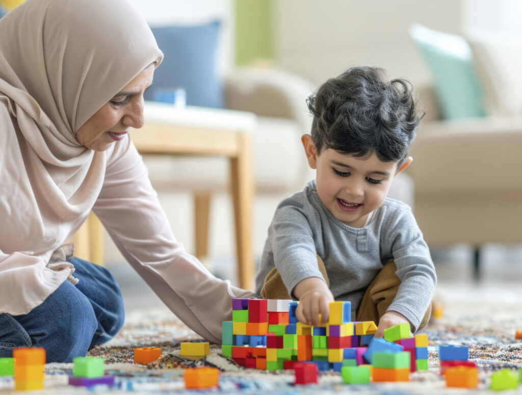 young child with autism playing with family